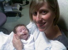 Here is Sadie holding her first daughter, Eva, in the NICU.